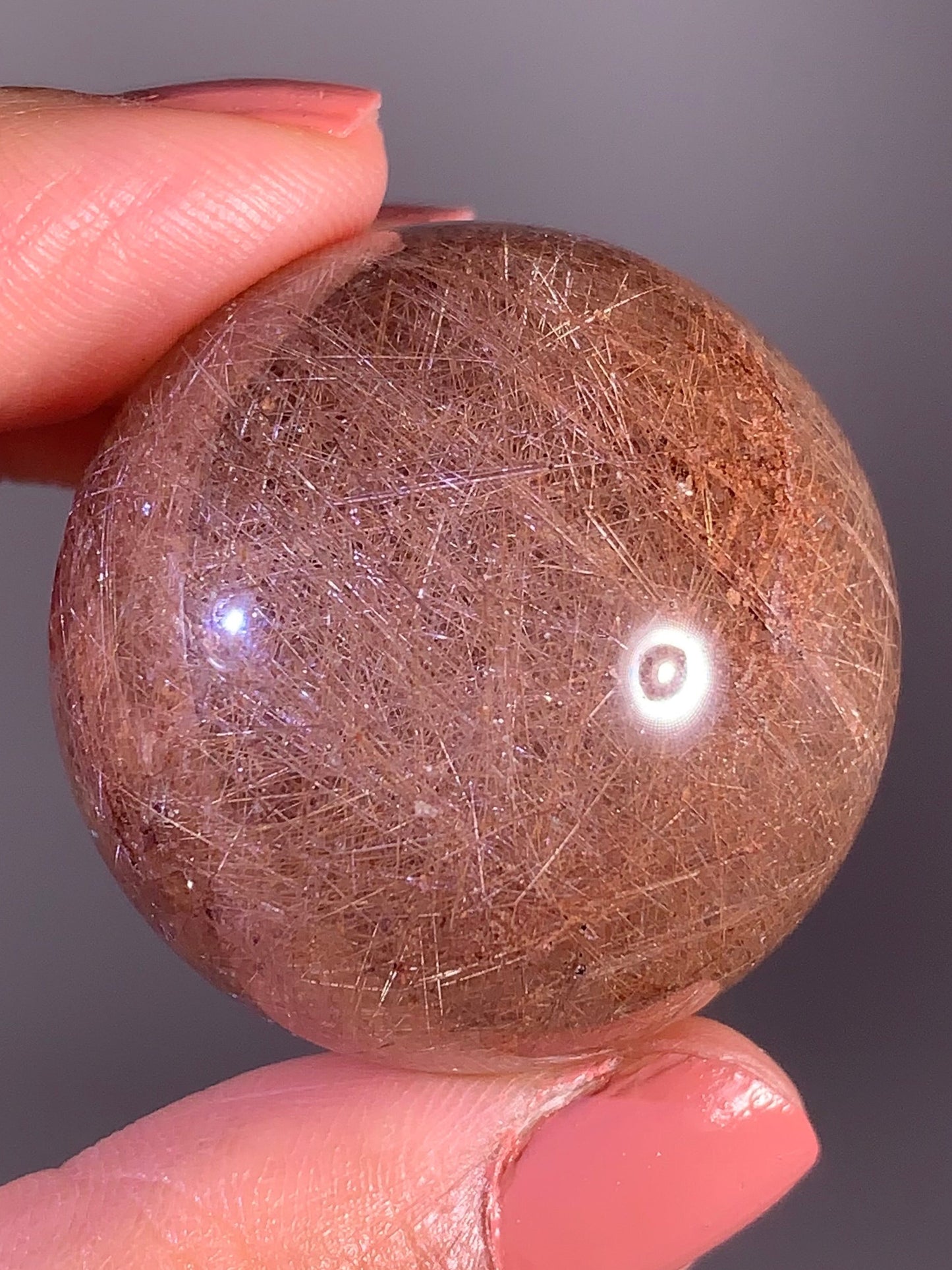 High-Grade Gold Rutile Quartz Sphere with Pink Lodolite (Garden) Coating and Starlight Effect — Brazil