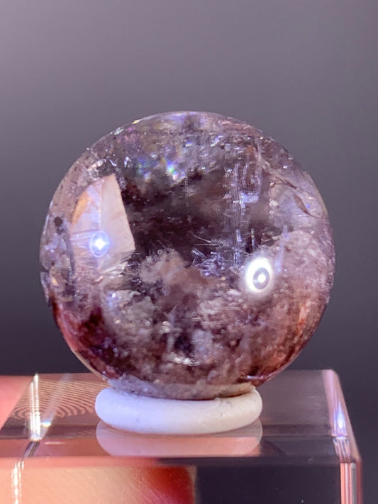 Pink Amphibole with Quartz in quartz sphere from Brazil