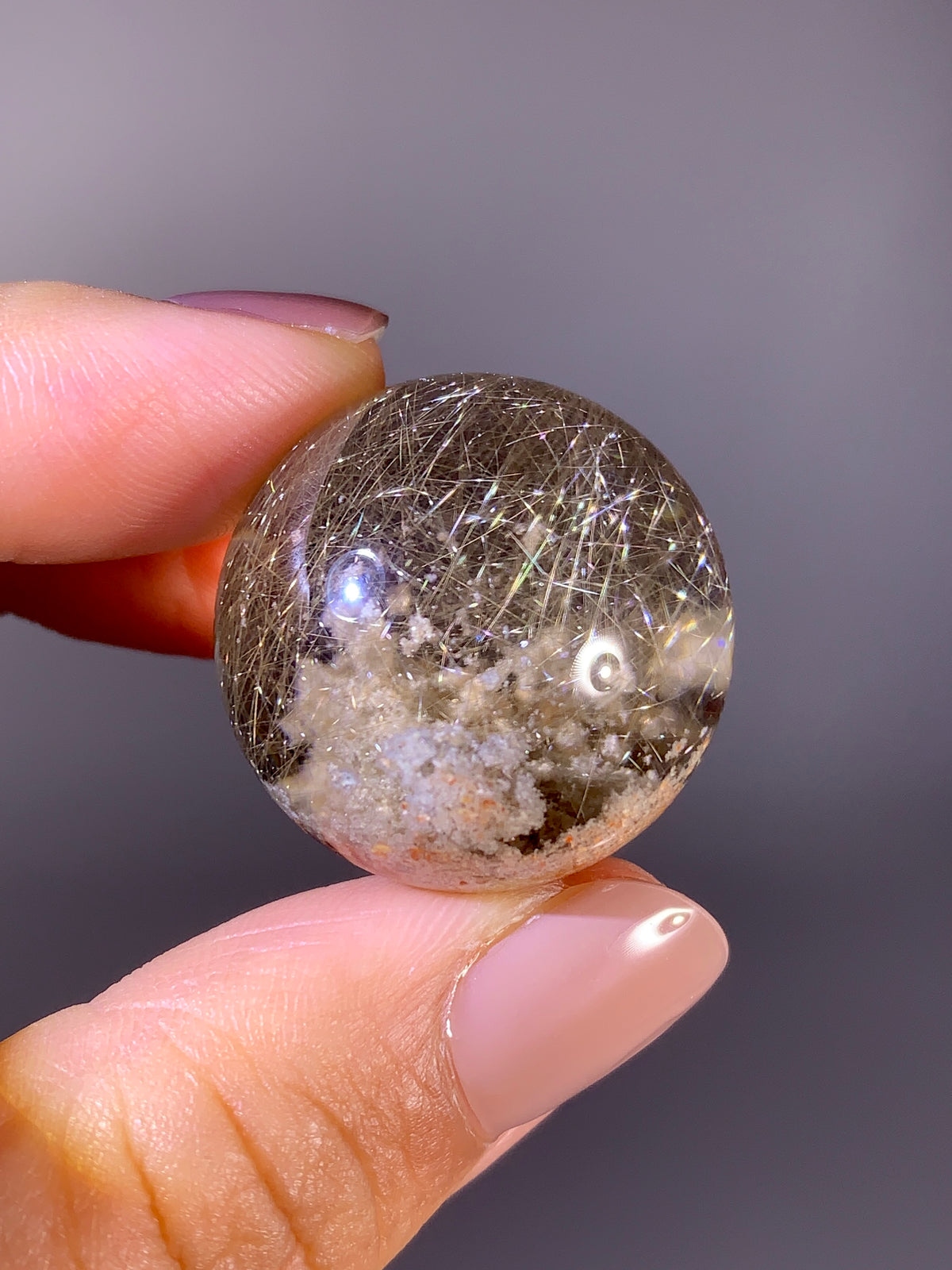 Collector’s Grade Gold Shooting Star Rutile & White Garden Quartz Sphere in Light Smoky Quartz | Brazil